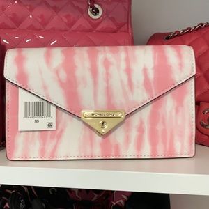 Michael Joe’s crossbody envelope pink clutch